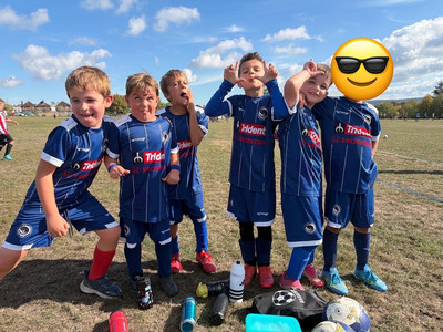 Ottershaw Junior Football Club's new Under-7s proudly show off their kit