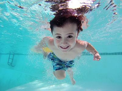 Boy in a swimming pool