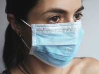 Woman wearing surgical face mask