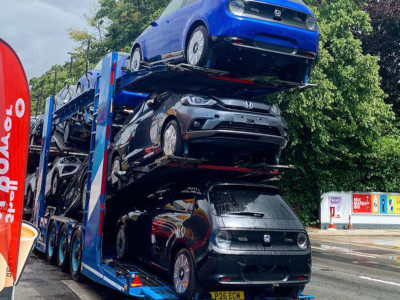 Our Honda e demonstrator arrives by transporter