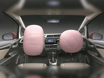 Inside of a Honda where the front airbags have been deployed