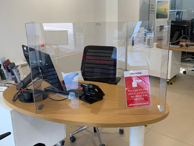 Sneeze screens have been installed at every desk